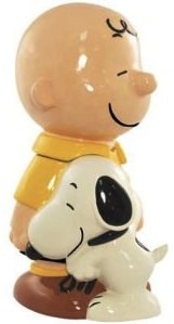 Charlies Brown and Snoopy hugging each other on this cookie jar