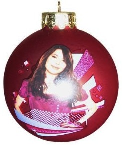 Red glass ball christmas ornament with a picture of Miranda Cosgrove (iCarly)